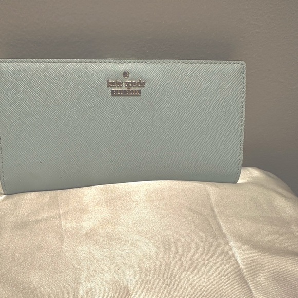 Kate Spade large slim bifold wallet light blue lightly used - Picture 1 of 4